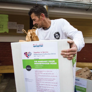 An MIT volunteer delivers supplies to a local nonprofit